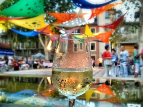 A glass of wine in a Nimes square A glass of wine in a Nimes square